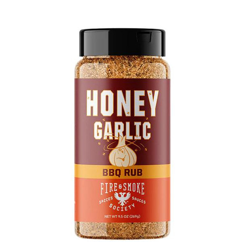 Fire & Smoke Society F&S Honey Garlic BBQ Rub, 9.5 oz jar of honey garlic BBQ spice rub with a black lid and a label featuring the product name and branding.