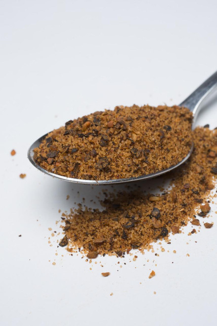 Fire & Smoke Society F&S Thundering Longhorn Beef Rub, a 12.5 oz container with seasoned beef rub spice mixture in a metal scoop on white background.