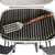 GrillGrate® for PK360, stainless steel grilling grate with elevated ridges, included with a wooden-handled spatula labeled GrillGrate for outdoor barbecue grilling.