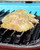 GrillGrate® for The Original & PK300 Grill, seasoned chicken breasts cooking on the grill with spice and herb seasoning.