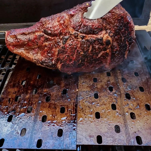 GrillGrate® for The Original & PK300 Grill, cooking a large seasoned steak on the grill surface.