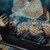 GrillGrate® for The Original & PK300 Grill, grilling steaks on a barbecue grill with visible grill marks and smoke.