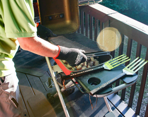 GrillGrate® for The Original & PK300 Grill, a grilling accessory placed on a portable grill, used for enhanced cooking performance and grilling experience.