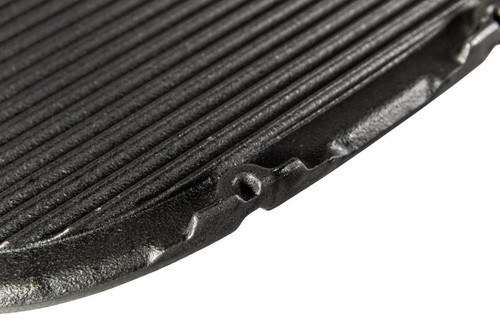 PK Grills Griddle for The PKGO, close-up of black cast iron griddle surface with ridges and textured finish.