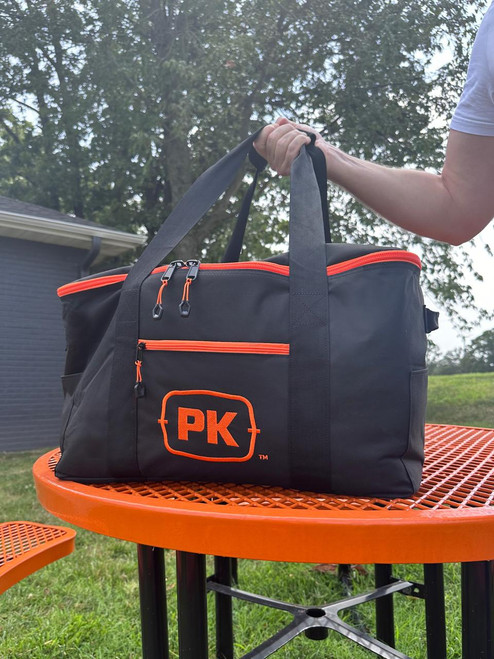 PK Grills PKGO Carrying Bag, black nylon carrying case with orange zippers and logo for portable grills.