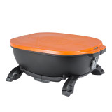 PK Grills PKGO Hibachi, portable black and orange tabletop charcoal grill with foldable legs.