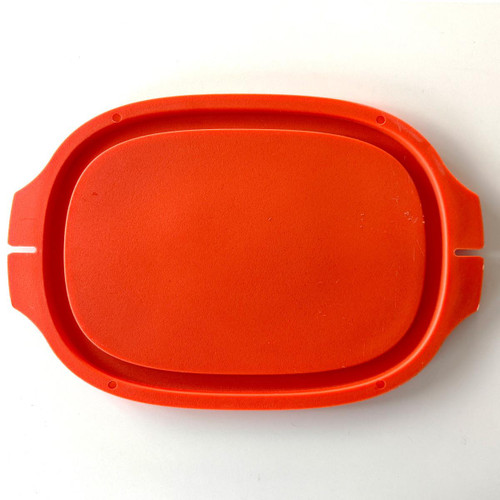 PK Grills PKGO Locking Cutting Board Cover, orange silicone kitchen accessory for grill mounting and protection.