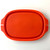 PK Grills PKGO Locking Cutting Board Cover, orange silicone kitchen accessory for grill mounting and protection.
