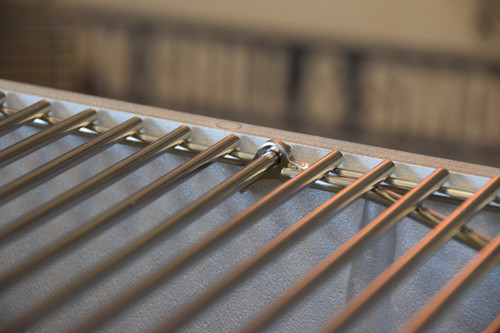 PK Grills Stainless Steel Cooking Grid for Original PK, close-up image of the shiny stainless steel cooking grid.