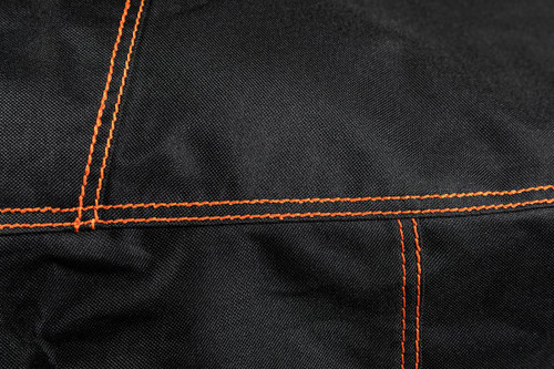 PK Grills The All New PK360 Slim Cover, close-up of black fabric with orange stitching.