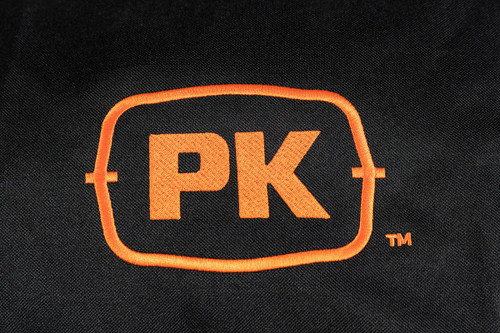 PK Grills The All New PK360 Slim Cover, close-up view of the embroidered logo on the black grill cover showcasing the orange stitching and branding.