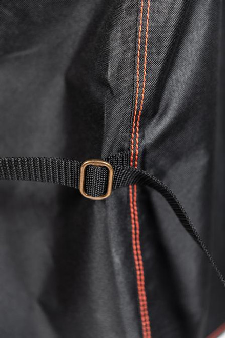 PK Grills The NEW PK300 Slim Cover, close-up of the black grill cover with red stitching and strap details.