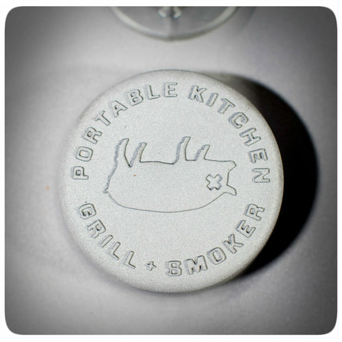 PK Grills The PK360 Grill & Smoker - Classic Silver, close-up of the lid with embossed PK Grills logo and text.