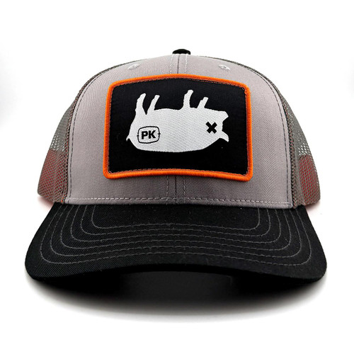 PK Pig Hat Ash Grey, structured baseball cap with a black brim, grey front panels, and mesh side panels, featuring a patch with a white pig illustration and orange border.