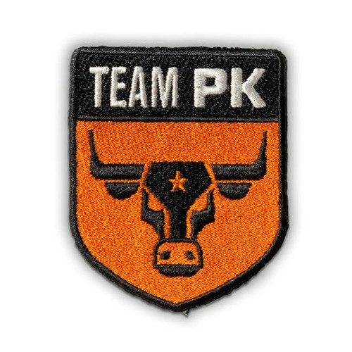 PK Team PK Woven Patch - Iron On, embroidered patch with a black and orange design featuring a bull's head and the text 'TEAM PK' at the top.